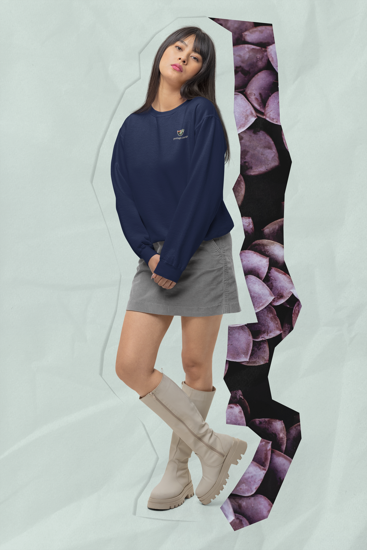 Seen Briefly Garment-Dyed Crewneck in True Navy, worn by a woman in a studio, with the Seen Briefly logo and portage.camp on the chest. Digital product mockup.