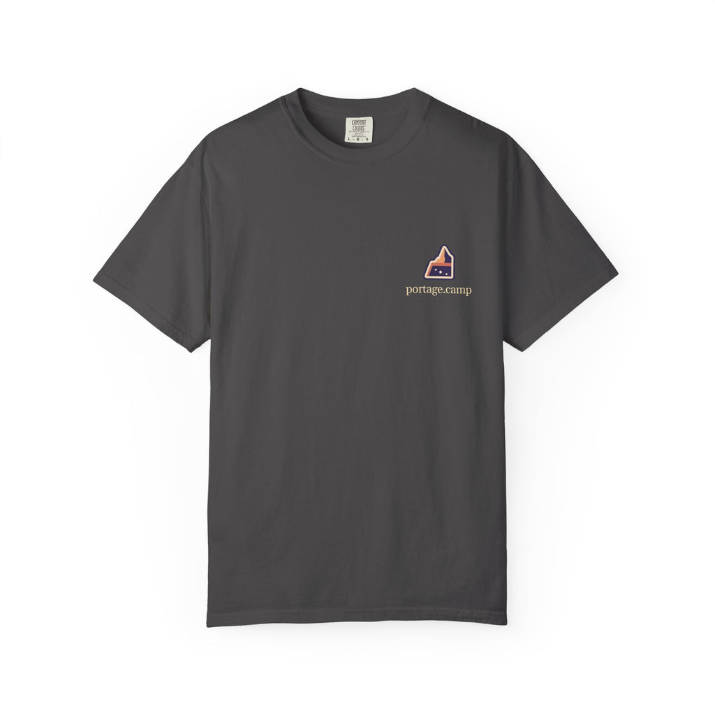 A Different Sky Garment-Dyed Tee in Graphite, front view with the A Different Sky logo and portage.camp on the chest. Digital product mockup.