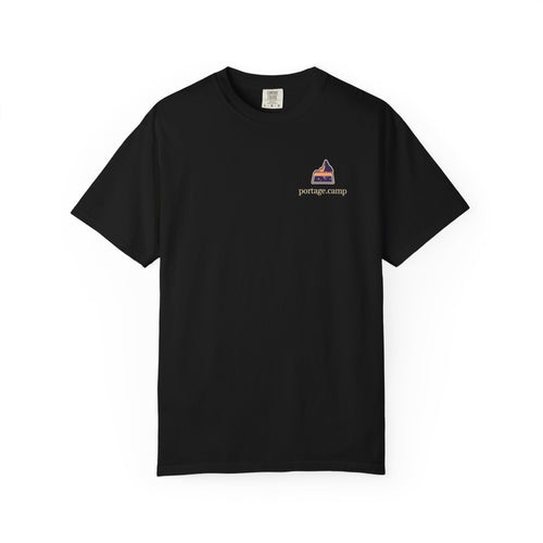 A Different Sky Garment-Dyed Tee in Black, front view with the A Different Sky logo and portage.camp on the chest. Digital product mockup.