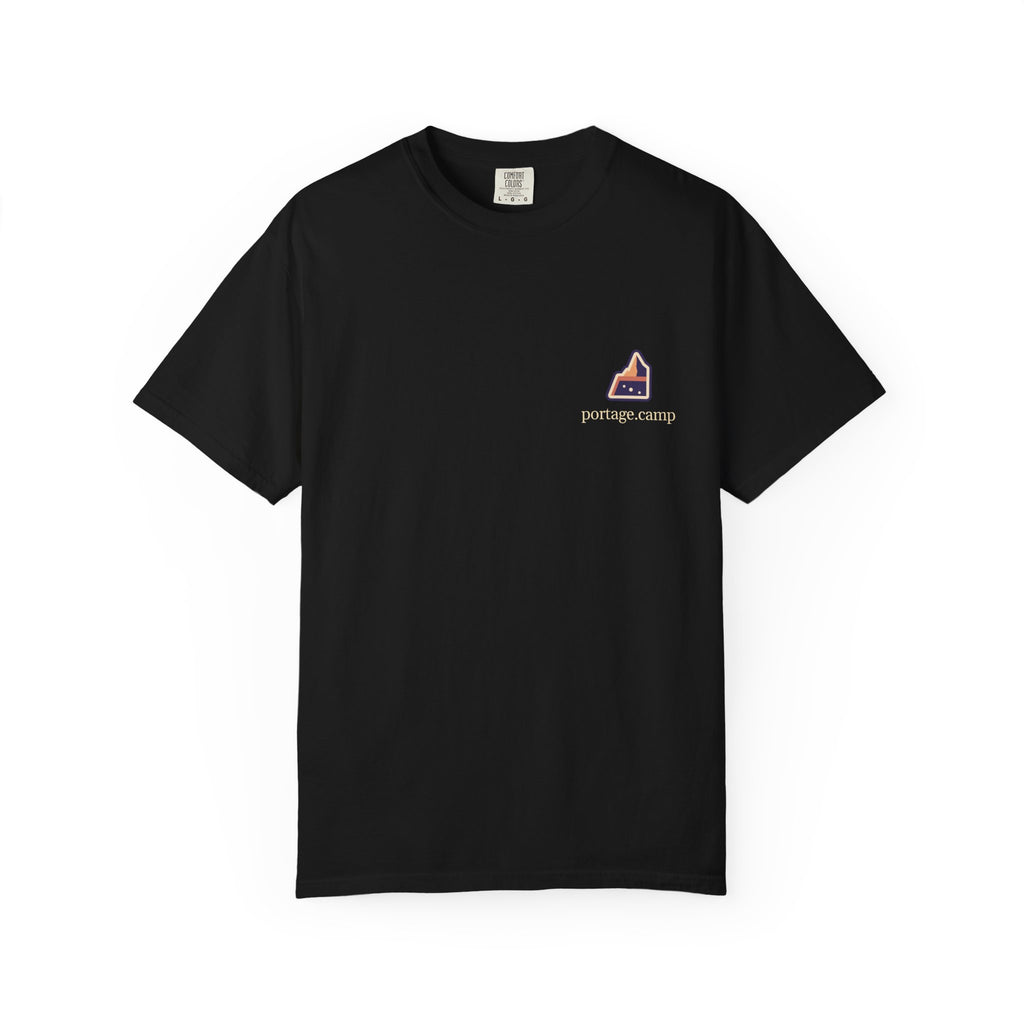 A Different Sky Garment-Dyed Tee in Black, front view with the A Different Sky logo and portage.camp on the chest. Digital product mockup.