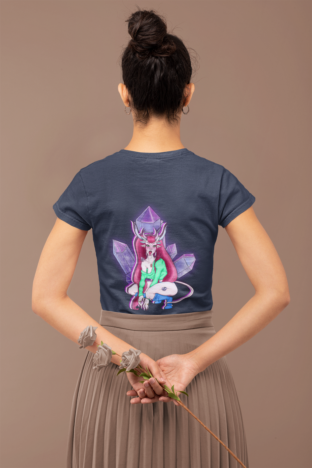 Heart Thief Women’s Relaxed Tee in Navy, worn by a woman seen from behind holding flowers, showing the large print on the back. Digital product mockup.