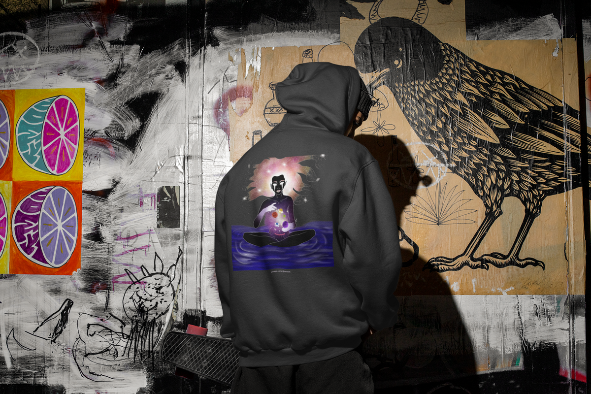 Orbit Keeper Zip Hoodie in Black, worn by a man seen from behind in a dark alley, showing the large print on the back. Digital product mockup.