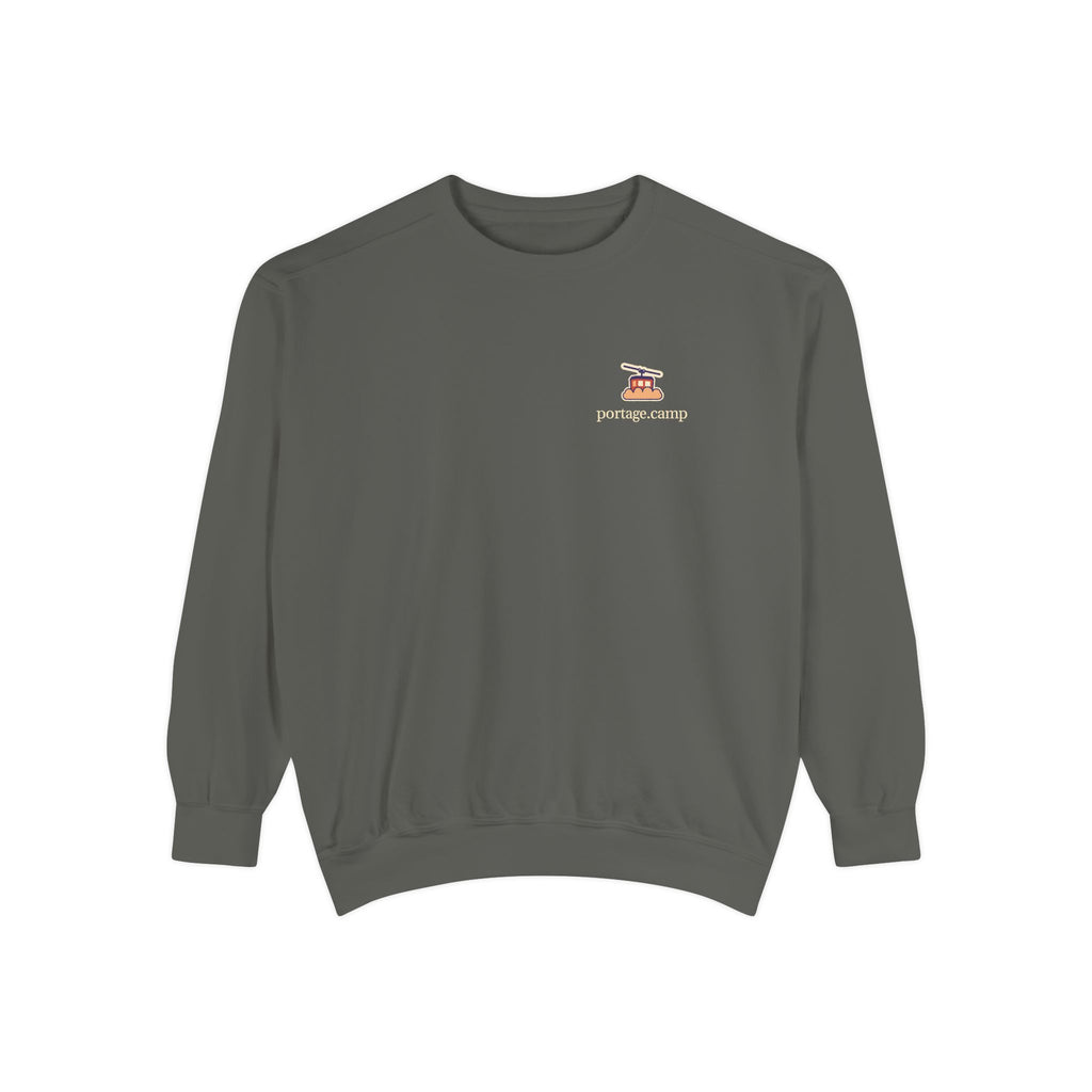 Cloud Ferry Garment-Dyed Crewneck in Pepper, front view with the Cloud Ferry logo and portage.camp on the chest. Digital product mockup.