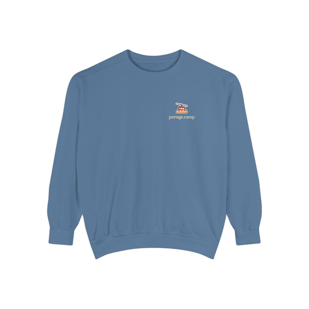 Cloud Ferry Garment-Dyed Crewneck in Blue Jean, front view with the Cloud Ferry logo and portage.camp on the chest. Digital product mockup.