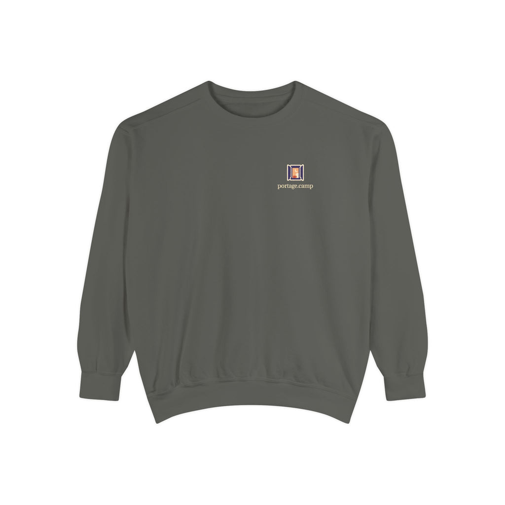 Open Late Garment-Dyed Crewneck in Pepper, front view with the Open Late logo and portage.camp on the chest. Digital product mockup.