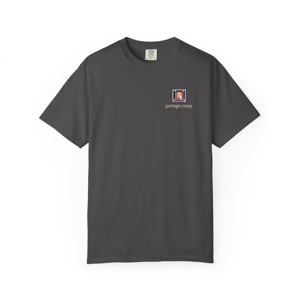 Open Late Garment-Dyed Tee in Graphite, front view with the Open Late logo and portage.camp on the chest. Digital product mockup.
