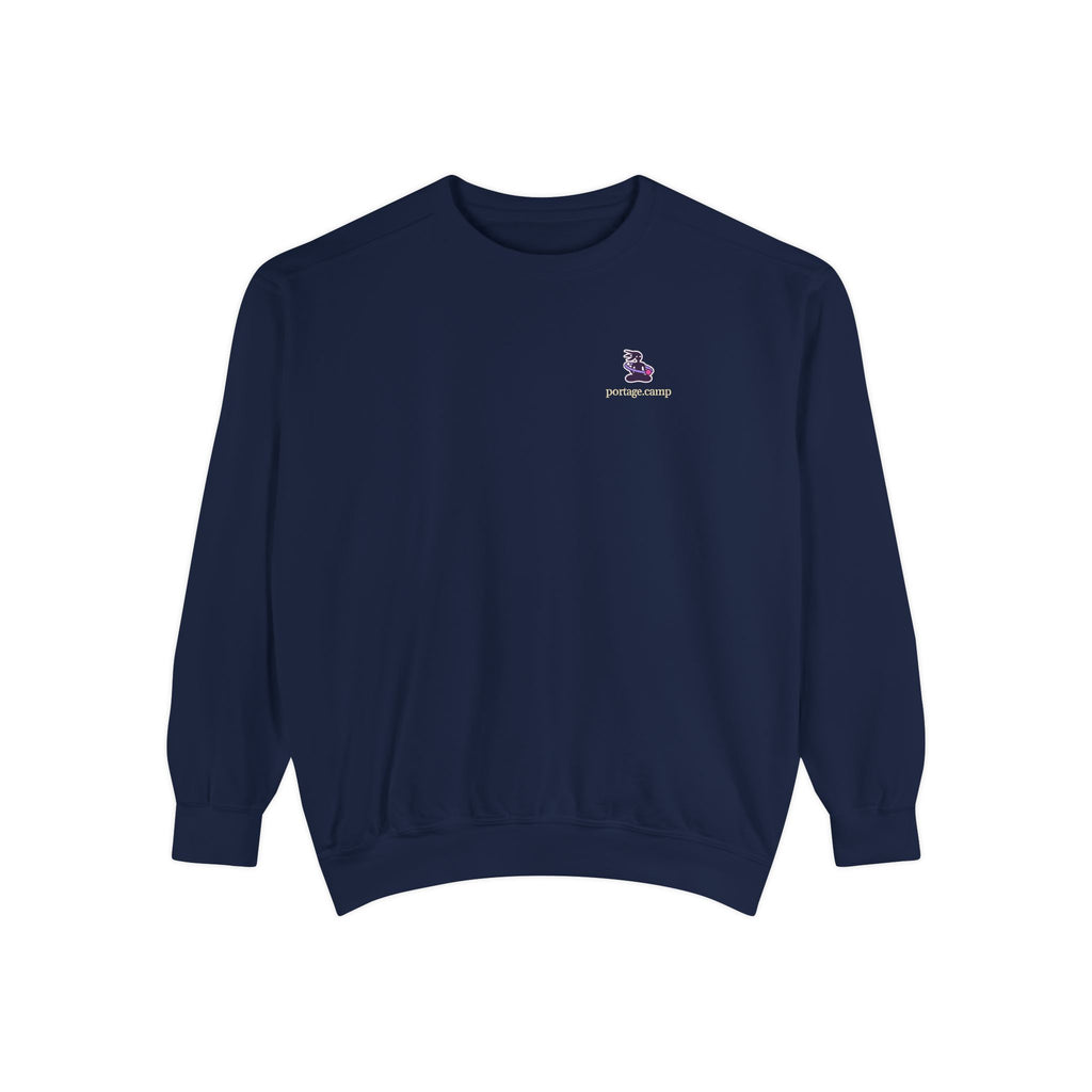 Orbit Keeper Garment-Dyed Crewneck in True Navy, front view with the Orbit Keeper logo and portage.camp on the chest. Digital product mockup.