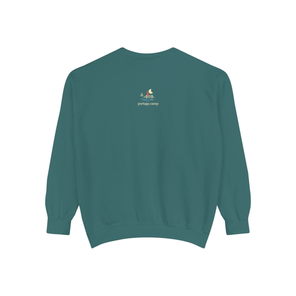 Quiet Hours Garment-Dyed Crewneck (Front Print) in Blue Spruce, back view with the portage.camp emblem at the upper back. Digital product mockup.