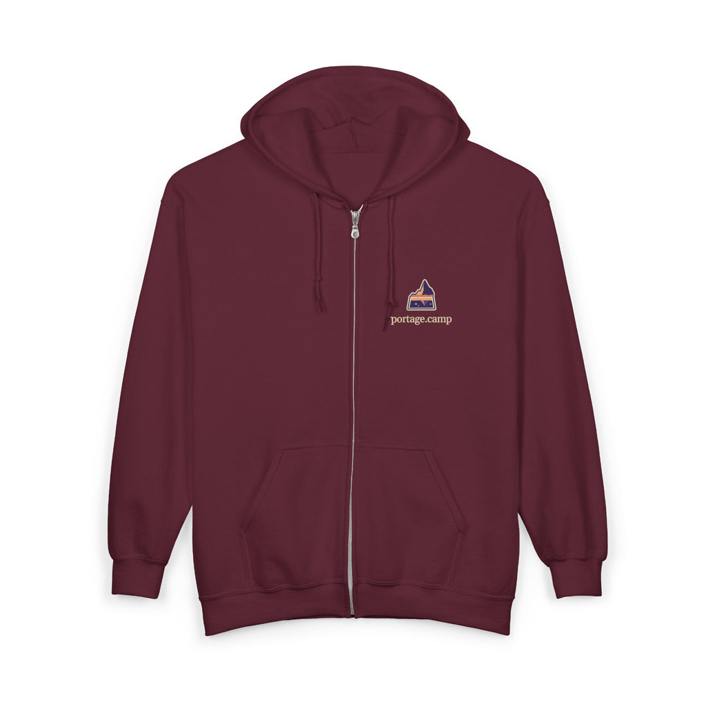 A Different Sky Zip Hoodie in Maroon, front view with the A Different Sky logo and portage.camp on the left chest. Digital product mockup.