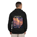 Cloud Ferry Zip Hoodie in Black, worn by a man seen from behind in a plain white studio, showing the large print on the back. Digital product mockup.