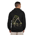 Small Hours Zip Hoodie in Black, worn by a man seen from behind in a plain white studio, showing the large print on the back. Digital product mockup.