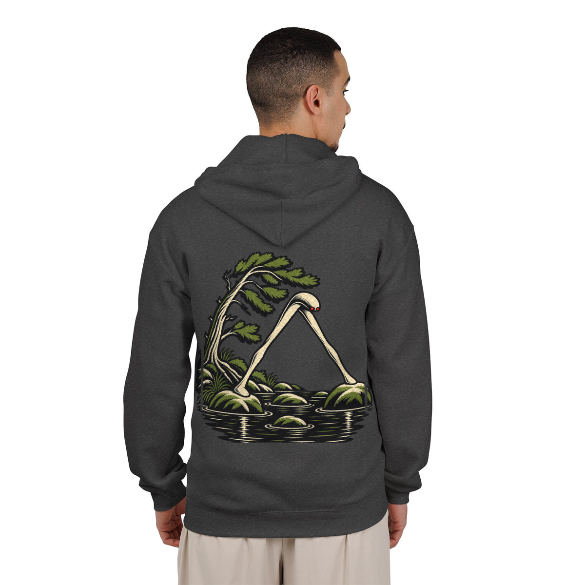 Small Hours Zip Hoodie in Dark Heather, worn by a man seen from behind in a plain white studio, showing the large print on the back. Digital product mockup.