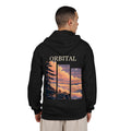 Edge of Evening Zip Hoodie in Black, worn by a man seen from behind in a plain white studio, showing the large print on the back. Digital product mockup.