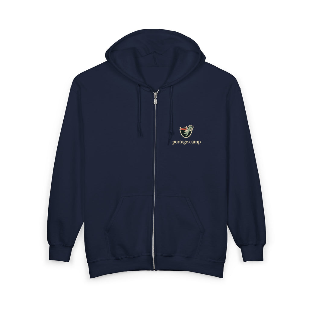 Seen Briefly Zip Hoodie in Navy, front view with the Seen Briefly logo and portage.camp on the left chest. Digital product mockup.