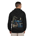 Quiet Hours Zip Hoodie in Black, worn by a man seen from behind in a plain white studio, showing the large print on the back. Digital product mockup.