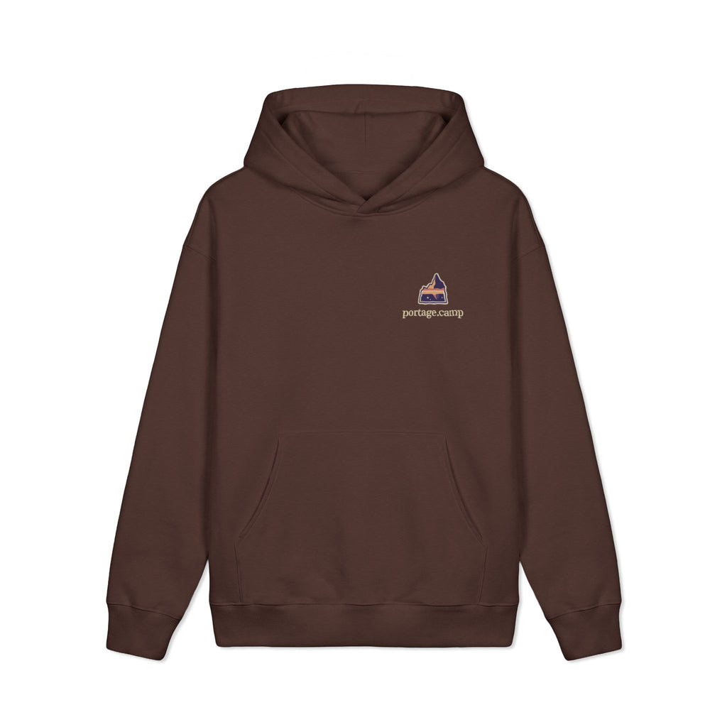 A Different Sky Heavyweight Hoodie in Brown, front view with the A Different Sky logo and portage.camp on the left chest. Digital product mockup.
