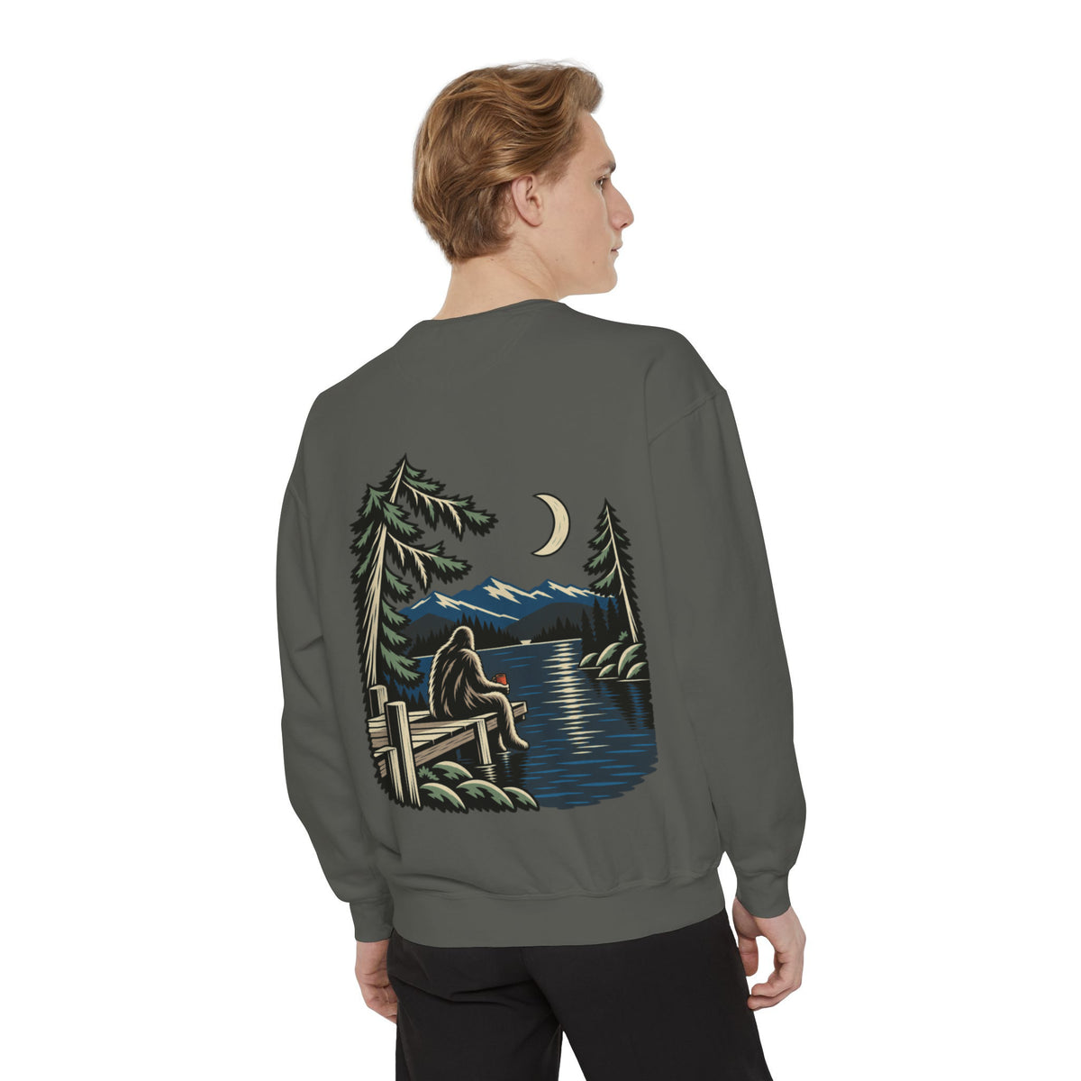 Quiet Hours Garment-Dyed Crewneck in Pepper, worn by a man seen from behind in a plain white studio, showing the large print on the back. Digital product mockup.
