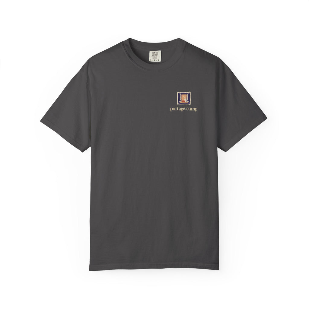 Open Late Garment-Dyed Tee in Graphite, front view with the Open Late logo and portage.camp on the chest. Digital product mockup.