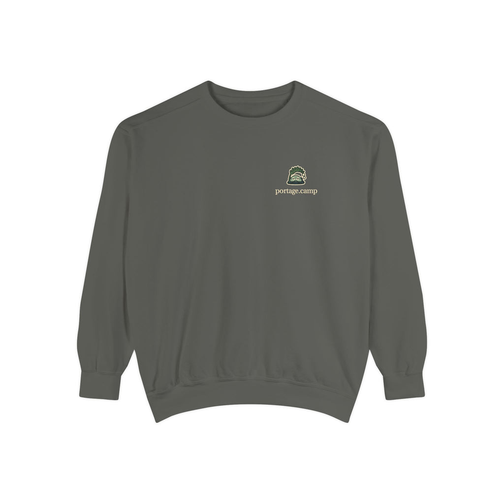 Rain Check Garment-Dyed Crewneck in Pepper, front view with the Rain Check logo and portage.camp on the chest. Digital product mockup.