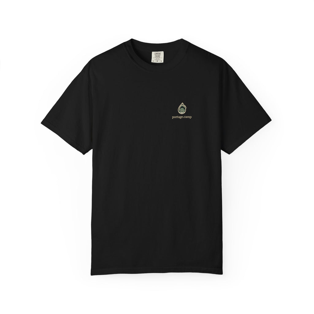 Rain Check Garment-Dyed Tee in Black, front view with the Rain Check logo and portage.camp on the chest. Digital product mockup.