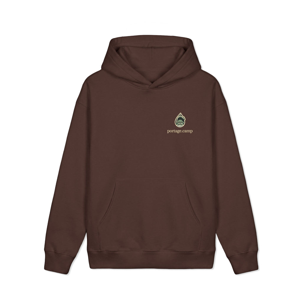 Rain Check Heavyweight Hoodie in Brown, front view with the Rain Check logo and portage.camp on the left chest. Digital product mockup.