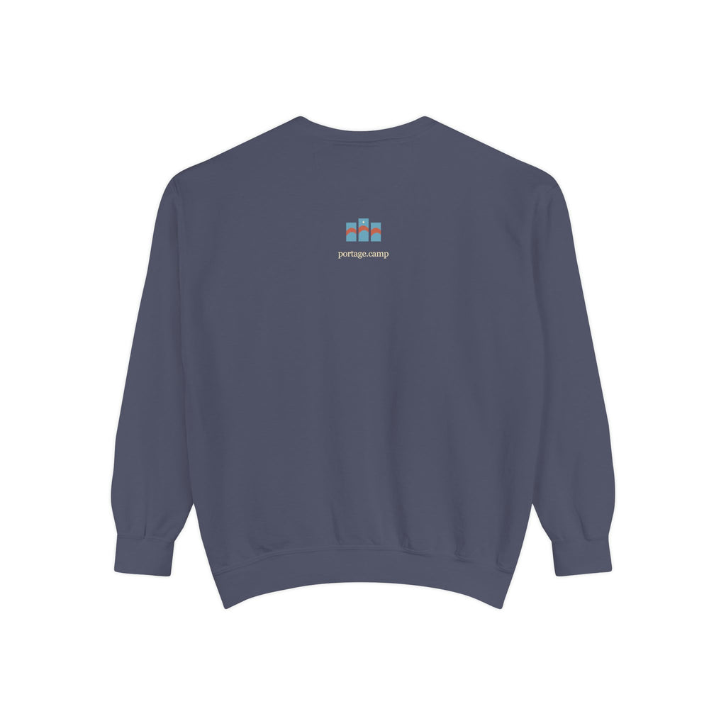 Stay for the Sky Garment-Dyed Crewneck (Front Print) in Denim, back view with the portage.camp emblem at the upper back. Digital product mockup.